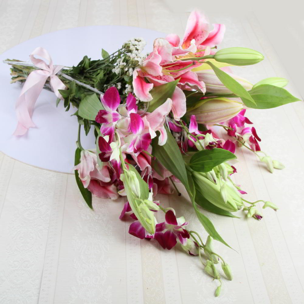 orchid and lily flower arrangement Orchids and Lilies Combination Bouquet – Flowersacrossindia.com