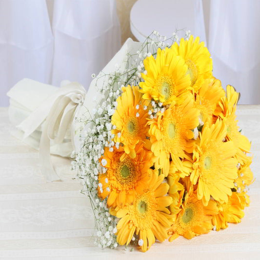 One Dozen Yellow Gerberas Tissue Bouquet
