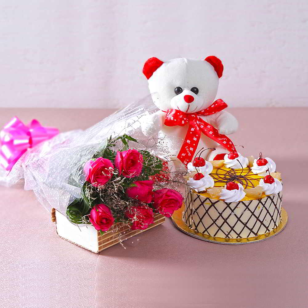 Bouquet of 6 Pink Roses with 1 kg Butterscotch Cake and Cuddly Bear