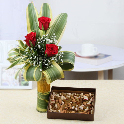 Dazzling Three Red Roses in Glass Vase with Assorted Dry Fruits Combo