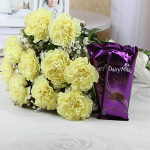Lovely Yellow Carnations Bouquet and Tempting Silk Chocolates