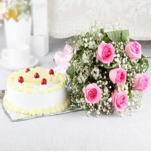 Yummy Half Kg Pineapple Cake with Bouquet of Six Pink Roses