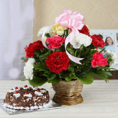 Eggless Black Forest Cake and Carnations Basket Combo