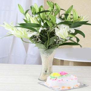 Tempting Vanilla Cake with White Lilies Arrangement