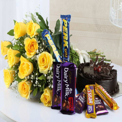 Bright Yellow roses with chocolates and Cake
