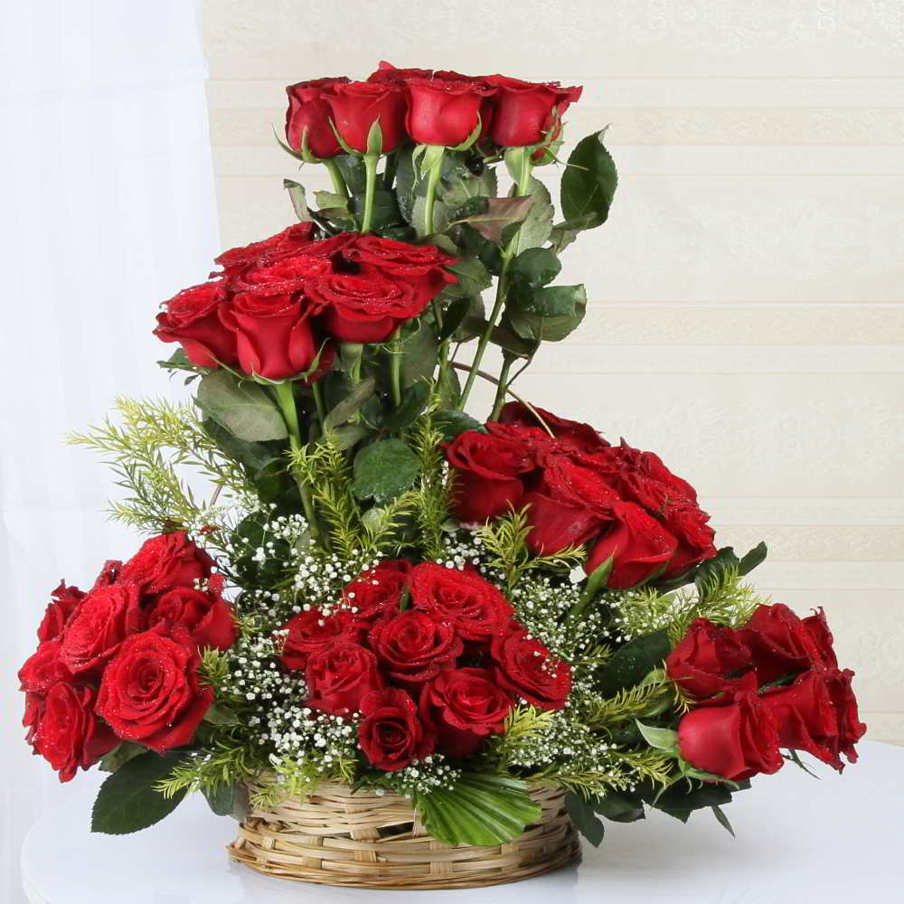 Arrangement of Fifty Red Roses in a Basket