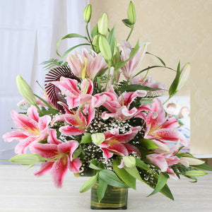 Glass vase arrangement of 15 Pink Lilies