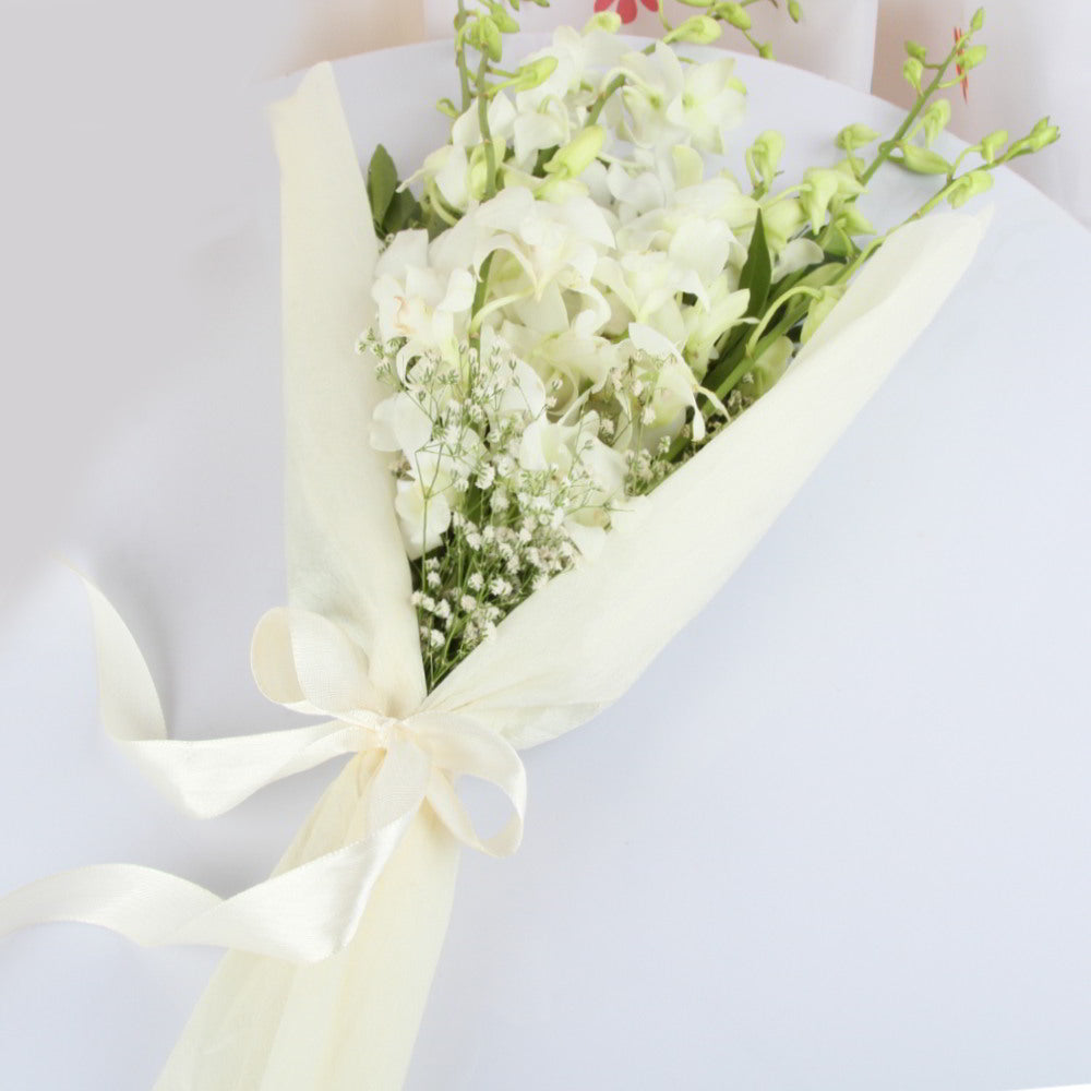 White Orchids in Tissue Wrapping