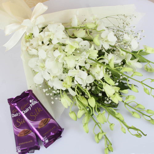 Eight White Orchids Bouquet with Cadbury Silk Chocolate