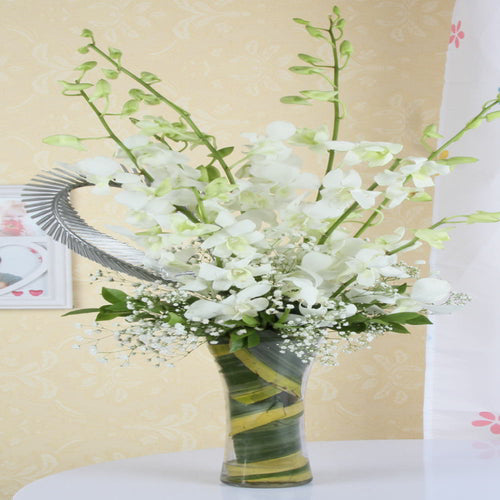 Exotic Vase Arrangement of White Orchids