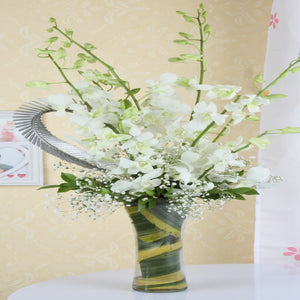 Exotic Vase Arrangement of White Orchids