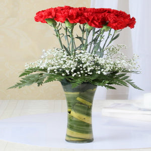 One Dozen Red Carnation in Vase