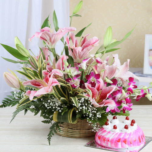 Arrangement of Lilies and Orchids and Strawberry Cake