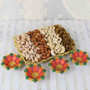 One Kg Assorted Dry fruit Tray with Four Earthen Diyas