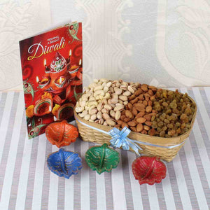 Assorted Dry fruit Basket and Four Earthen Diyas with Diwali Greeting Card