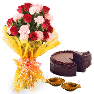 Diwali Decoratives Diya with Roses Carnations Bouquet and Cake