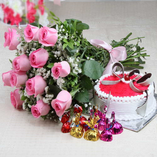 Bouquet of Pink Roses and Strawberry Cake with Home Made Chocolate
