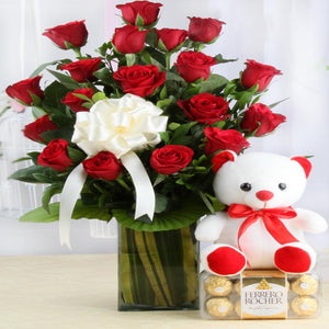 Ravishing Red Roses Vase and Rocher Chocolate along with Teddy Bear
