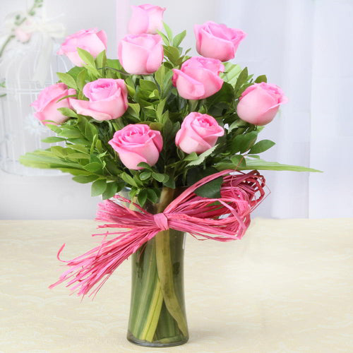 Arrangement of Pink Roses in a Glass vase