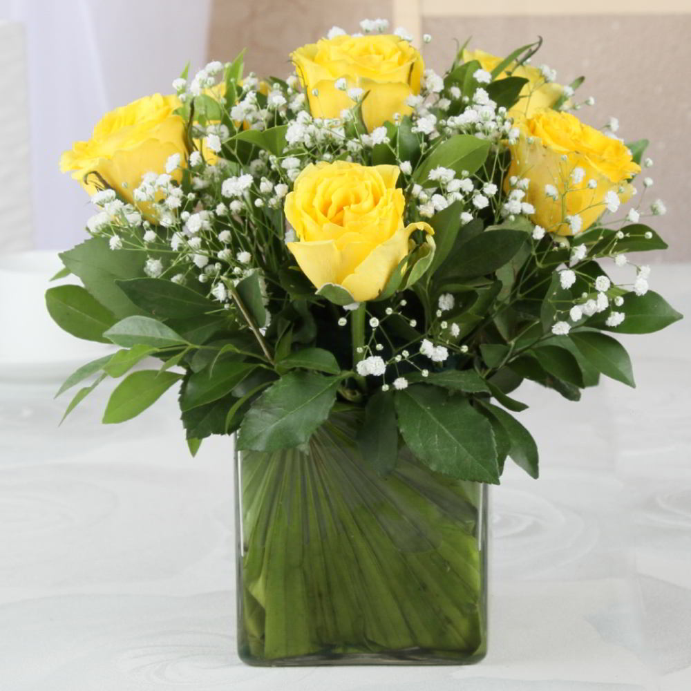 Six Lovely Yellow Roses in a Vase – Flowersacrossindia.com